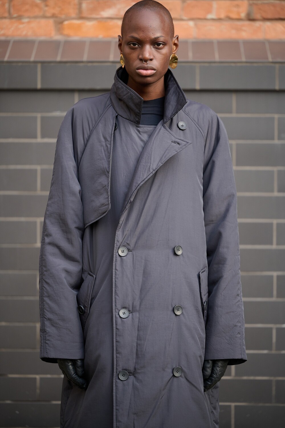 Insulated coat made of raincoat fabric